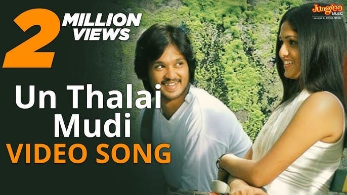 Un Thalai Mudi Lyrics