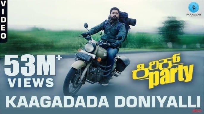 Kaagadada Doniyalli Lyrics